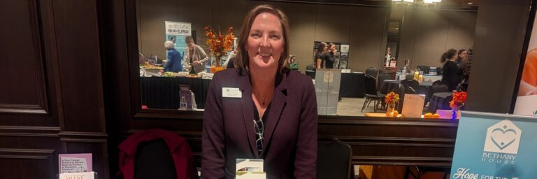 Deidra at event table